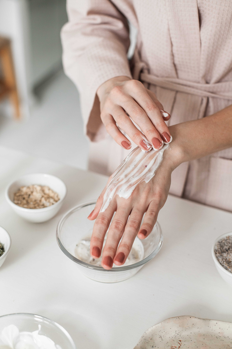 Woman Giving Herself a Hand Scrub